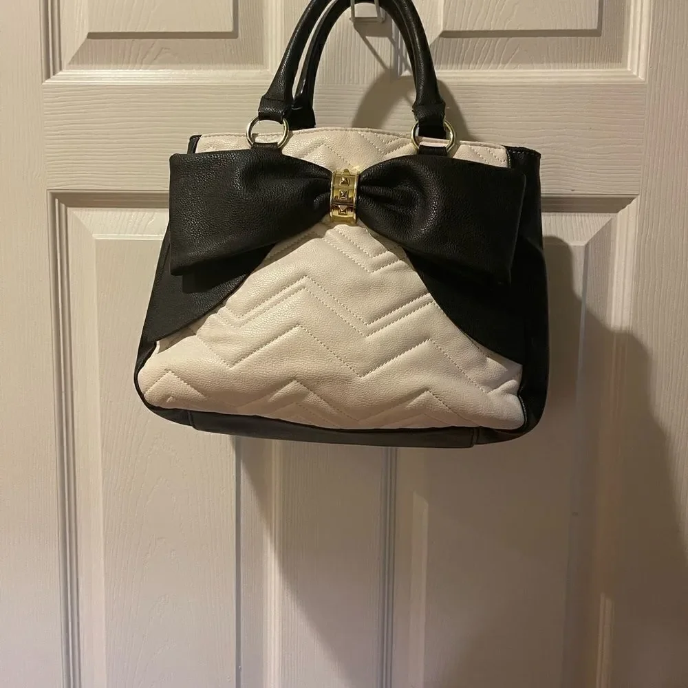 Betsey Johnson off white & Black quilted faux leather satchel with bow accent